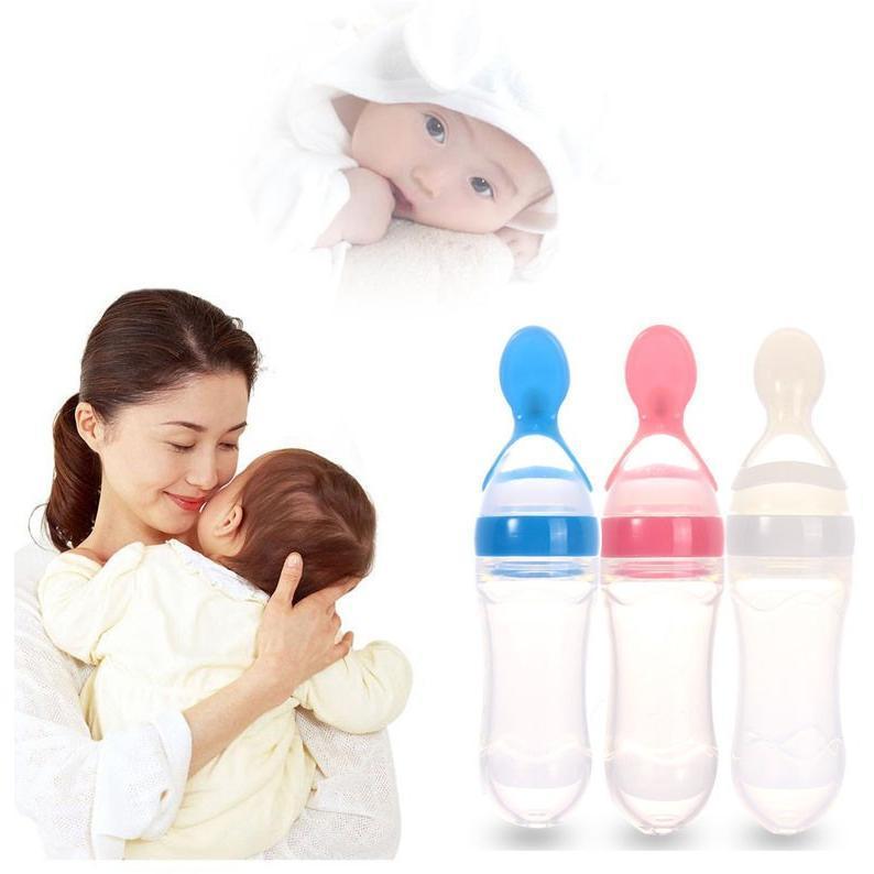 Feeding Bottle With Spoon Dispenser