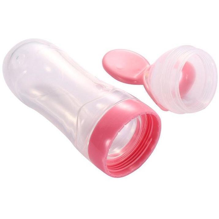 Feeding Bottle With Spoon Dispenser