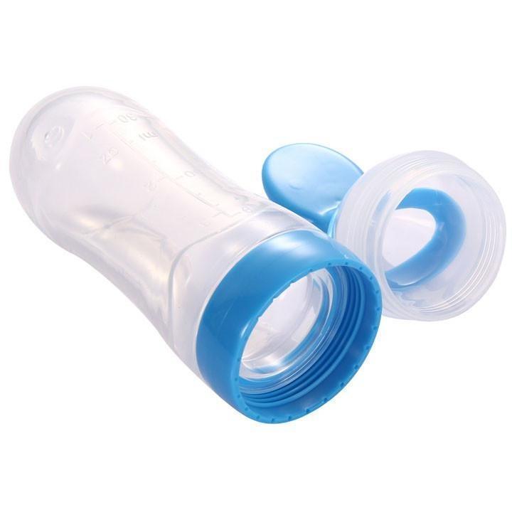 Feeding Bottle With Spoon Dispenser